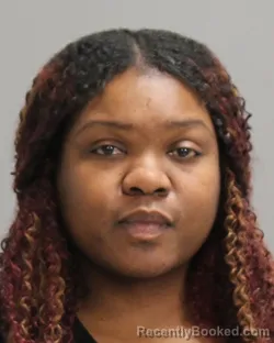 Mugshot of Protella Denise-Uniq Peoples booked in Brazos County, Texas on August 29, 2026