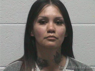 Mugshot of DOMINIQUE ELODIA REYES booked in Lyon County, Nevada on August 2, 2026