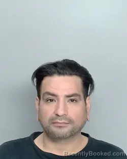 Mugshot of MIGUEL JR. GONZALEZ
