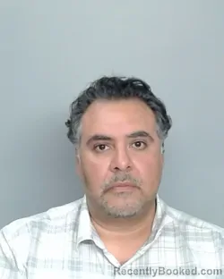 Mugshot of CARLOS PARVIZ MEHDI booked in Nye County, Nevada on March 10, 2026