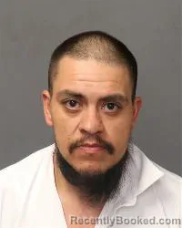 Mugshot of Carlos Ben Martinez