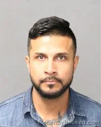 Mugshot of Andres Holguin