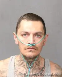 Mugshot of Marcos L Feliciano-Delgado