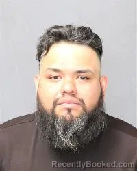 Mugshot of Roberto Puents