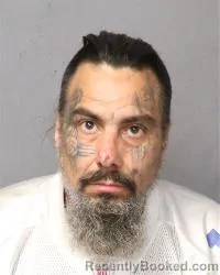 Mugshot of Alex Rivera