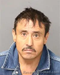 Mugshot of Jaime Bustillos booked in Bernalillo County, New Mexico on March 12, 2026