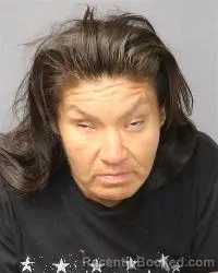 Mugshot of Amy Nicole Booqua booked in Bernalillo County, New Mexico on March 13, 2026