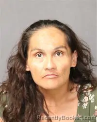 Mugshot of Yesica Jessica Flores booked in Bernalillo County, New Mexico on March 23, 2026