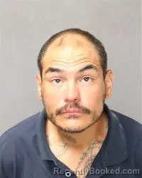 Mugshot of Juan Jesus Olivas booked in Bernalillo County, New Mexico on March 24, 2026