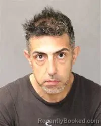 Mugshot of Alireza Alaghehbandi booked in Bernalillo County, New Mexico on March 26, 2026