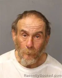 Mugshot of Manuel Adam Alires booked in Bernalillo County, New Mexico on March 27, 2026