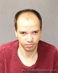 Mugshot of John D Lopez booked in Bernalillo County, New Mexico on March 28, 2026