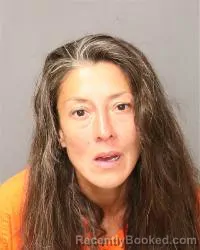 Mugshot of Monique Antoinette Hidalgo booked in Bernalillo County, New Mexico on March 29, 2026