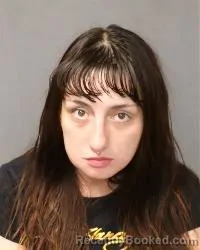 Mugshot of Karra Estelle Coriz booked in Bernalillo County, New Mexico on March 31, 2026