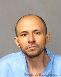 Mugshot of Miguel Angel Flores booked in Bernalillo County, New Mexico on April 2, 2026