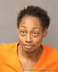 Mugshot of Alisha Shavon Kenney booked in Bernalillo County, New Mexico on April 23, 2026