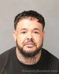 Mugshot of Alan R Figueroa-Quinones booked in Bernalillo County, New Mexico on April 24, 2026