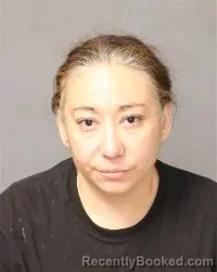 Mugshot of Marie Sheree Barela booked in Bernalillo County, New Mexico on April 27, 2026
