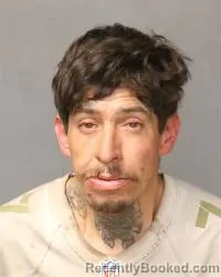 Mugshot of Howard M Olguin booked in Bernalillo County, New Mexico on April 28, 2026