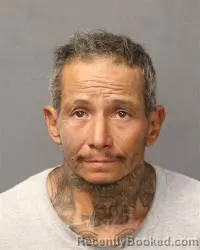 Mugshot of Juan Michael Flores booked in Bernalillo County, New Mexico on April 28, 2026
