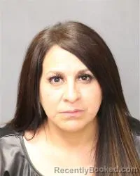 Mugshot of Alma A Cena-Nevarez booked in Bernalillo County, New Mexico on May 2, 2026