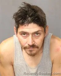 Mugshot of Ernesto J Gallegos booked in Bernalillo County, New Mexico on May 2, 2026