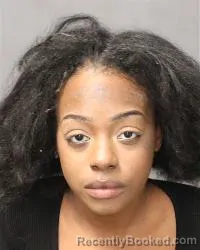 Mugshot of Dominique A Brown booked in Bernalillo County, New Mexico on May 8, 2026