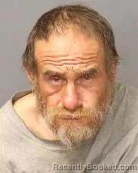 Mugshot of Manuel Adam Alires booked in Bernalillo County, New Mexico on May 8, 2026