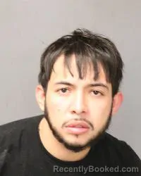 Mugshot of Juan Delgado booked in Bernalillo County, New Mexico on May 12, 2026