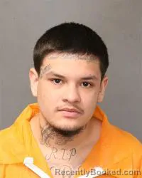 Mugshot of Oliver Peralta Jr booked in Bernalillo County, New Mexico on May 12, 2026