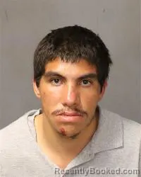 Mugshot of Michael Jovan Benavides booked in Bernalillo County, New Mexico on May 12, 2026