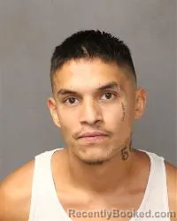 Mugshot of Christopher Garcia booked in Bernalillo County, New Mexico on May 13, 2026