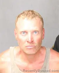 Mugshot of Christopher Daniel Grimes booked in Bernalillo County, New Mexico on May 14, 2026