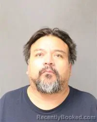 Mugshot of Dennis Damien Padilla booked in Bernalillo County, New Mexico on May 16, 2026