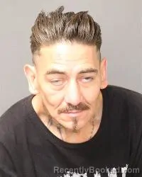 Mugshot of Enrique Rick Sandoval booked in Bernalillo County, New Mexico on May 21, 2026