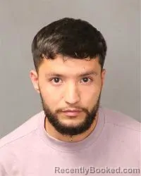 Mugshot of Atif Azimi booked in Bernalillo County, New Mexico on May 23, 2026