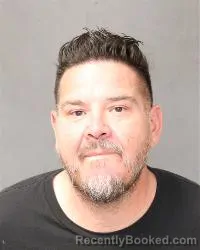 Mugshot of John Carlos Delgado booked in Bernalillo County, New Mexico on June 20, 2026