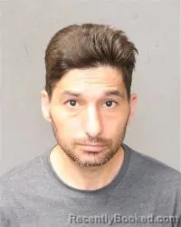 Mugshot of Kazem Aminy booked in Bernalillo County, New Mexico on June 21, 2026