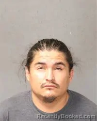 Mugshot of Alex Albert Toledo booked in Bernalillo County, New Mexico on June 28, 2026