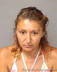 Mugshot of Cinthia Jasmin Alire booked in Bernalillo County, New Mexico on June 30, 2026
