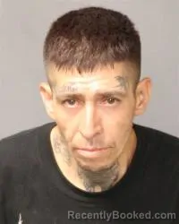 Mugshot of Howard M Olguin booked in Bernalillo County, New Mexico on July 5, 2026