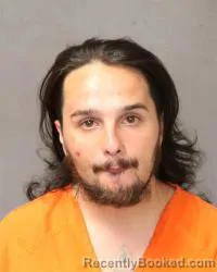 Mugshot of Julian Farhat booked in Bernalillo County, New Mexico on July 6, 2026