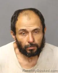 Mugshot of Miguel Angel Flores booked in Bernalillo County, New Mexico on July 8, 2026