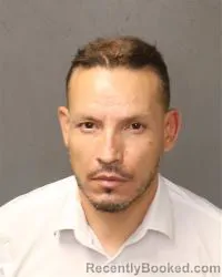 Mugshot of Jesus Roberto Cardenas-Garcia booked in Bernalillo County, New Mexico on July 8, 2026