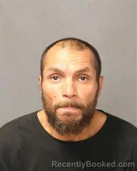 Mugshot of Mario Alberto Garcia booked in Bernalillo County, New Mexico on July 9, 2026
