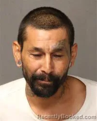 Mugshot of Sigfredo Andres Romero booked in Bernalillo County, New Mexico on July 13, 2026