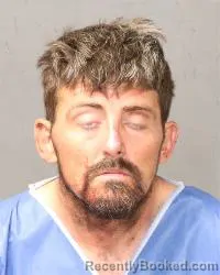 Mugshot of Justin Scott Hill booked in Bernalillo County, New Mexico on July 13, 2026