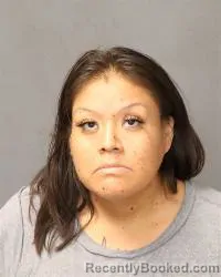 Mugshot of Calandra Wood Curley booked in Bernalillo County, New Mexico on July 14, 2026