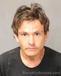 Mugshot of Johnathan Mansuy booked in Bernalillo County, New Mexico on August 7, 2026