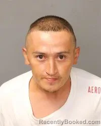 Mugshot of Adrian O Aguero booked in Bernalillo County, New Mexico on August 7, 2026